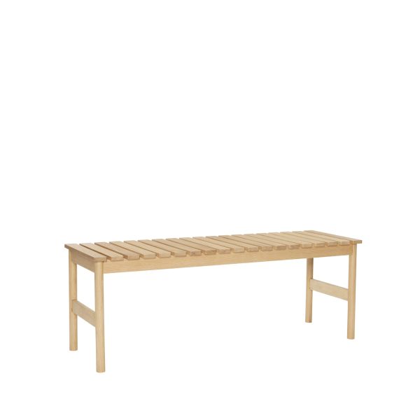 En enkel HÜBSCH - Row Bænk Stor bænk med et ligetil design og fire ben, sat mod en almindelig, neutral baggrund.