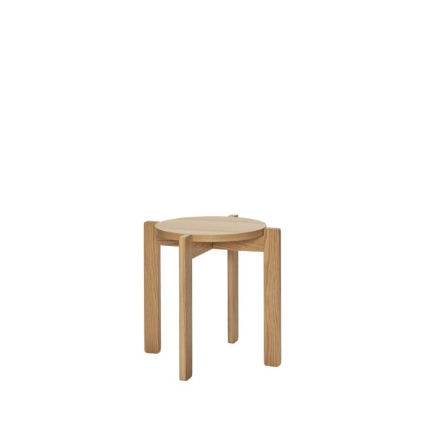 En simpel HÜBSCH - Altid Taburet med en rund top og fire lige ben, isoleret på en almindelig hvid baggrund.
