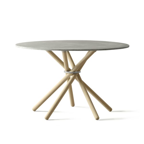 Et moderne rundt bord med en grå plade og en unik, på kryds og tværs designmøbler-sokkel, isoleret på hvid baggrund.