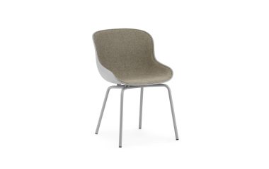En moderne stol med gråt metalstel og grønliggrå polstret sæde og ryglæn, isoleret på en hvid baggrund, eksemplificerer moderne design.