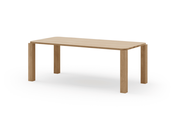 Et enkelt træbord med en rektangulær plade og fire robuste ben, placeret på en hvid baggrund. Dens design er minimalistisk og funktionelt, der er indbegrebet af moderne interiør-æstetik.