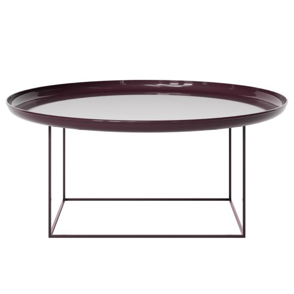 Et moderne NORR11 - Duke Sofabord Ø90 med en blank, oval top og en tynd, geometrisk metalramme, isoleret på en hvid baggrund.