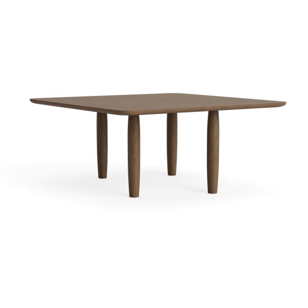 Et moderne spisebord i træ med en struktureret plade og vinklede, tilspidsede ben, vist mod en almindelig hvid baggrund, viser udsøgt design.