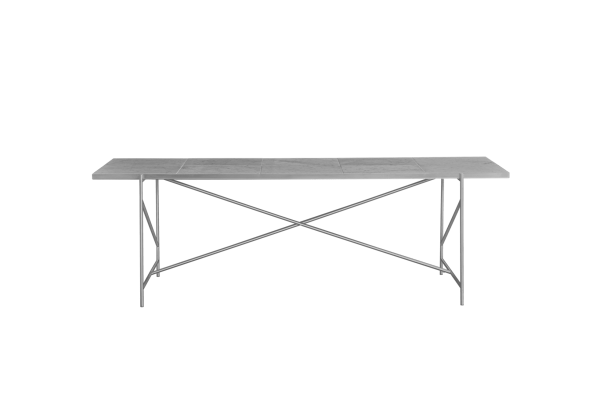 Et minimalistisk rektangulært bord med flisebelagt overflade og en enkel metalramme fra TomorrowsDesign, sat mod en solid grøn baggrund.