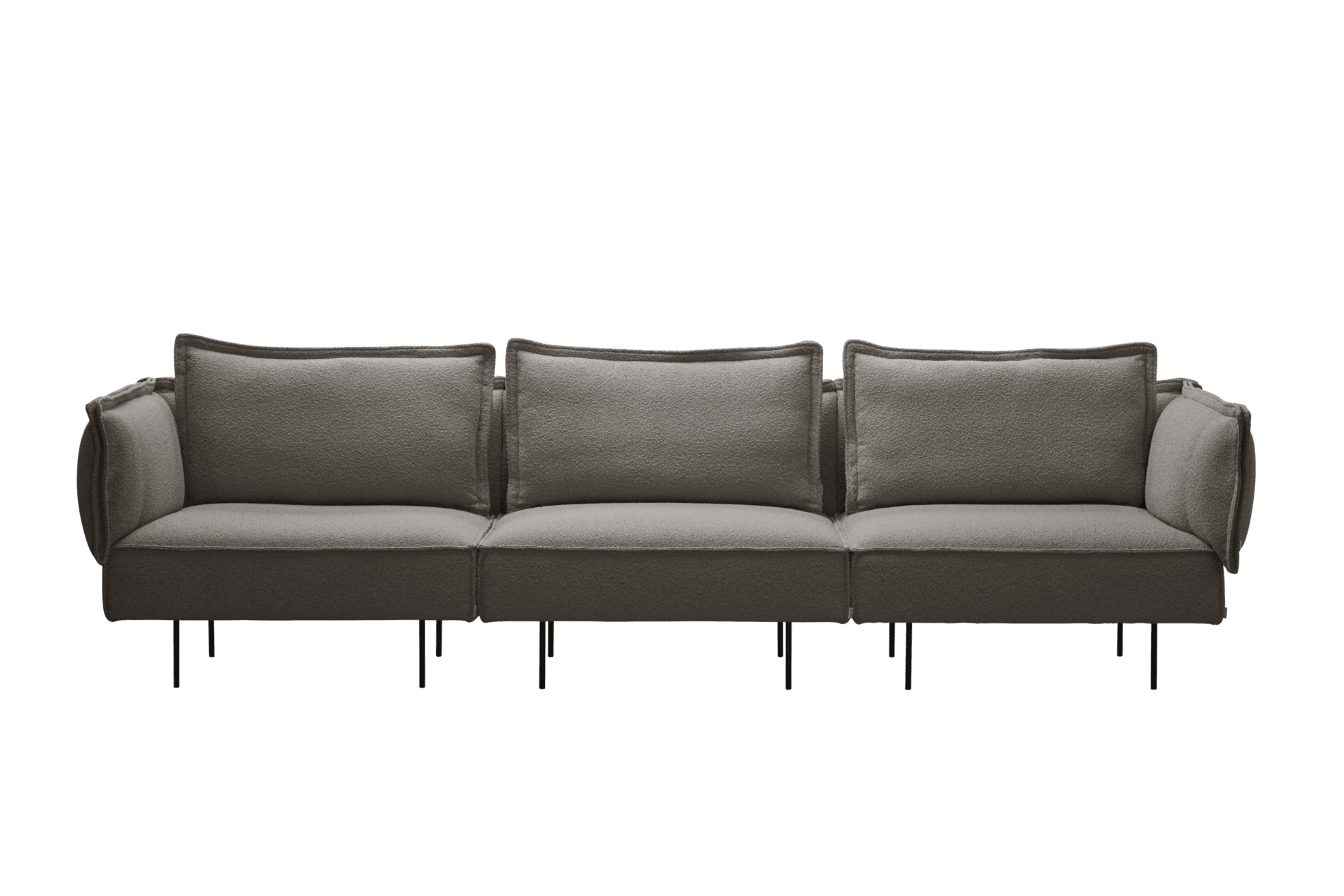 En moderne grå sektionssofa med plyshynder og tynde sorte ben, designet af TomorrowsDesign, sat mod en solid grøn baggrund.