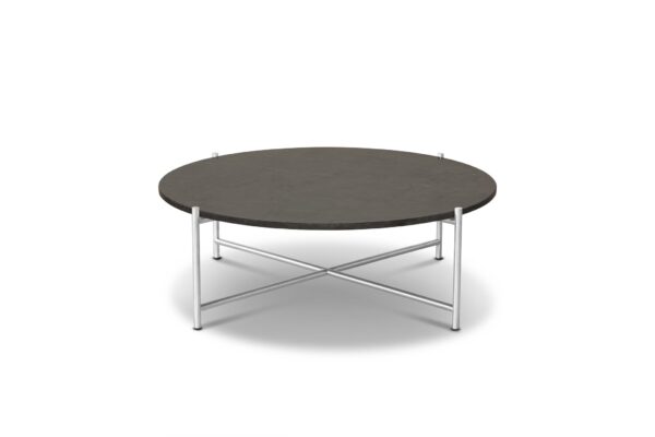 Et rundt bord med en mørkegrå plade og en sølvmetallic understel med en på kryds og tværs designmøbler, placeret på hvid baggrund.