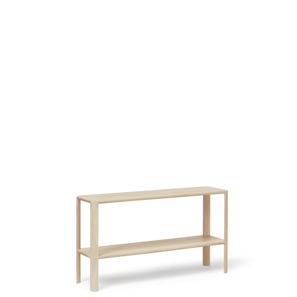 A FORM & REFINE - Leaf Reol 1x2 med et fladt sæde og en nederste hylde, placeret mod en almindelig grøn baggrund.